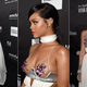 Illustration for article titled Boobs, Shoulders, Sequins Rihanna at the AmfAR Gala in L.A.